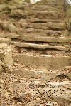Steps lead upward to an unknown destination